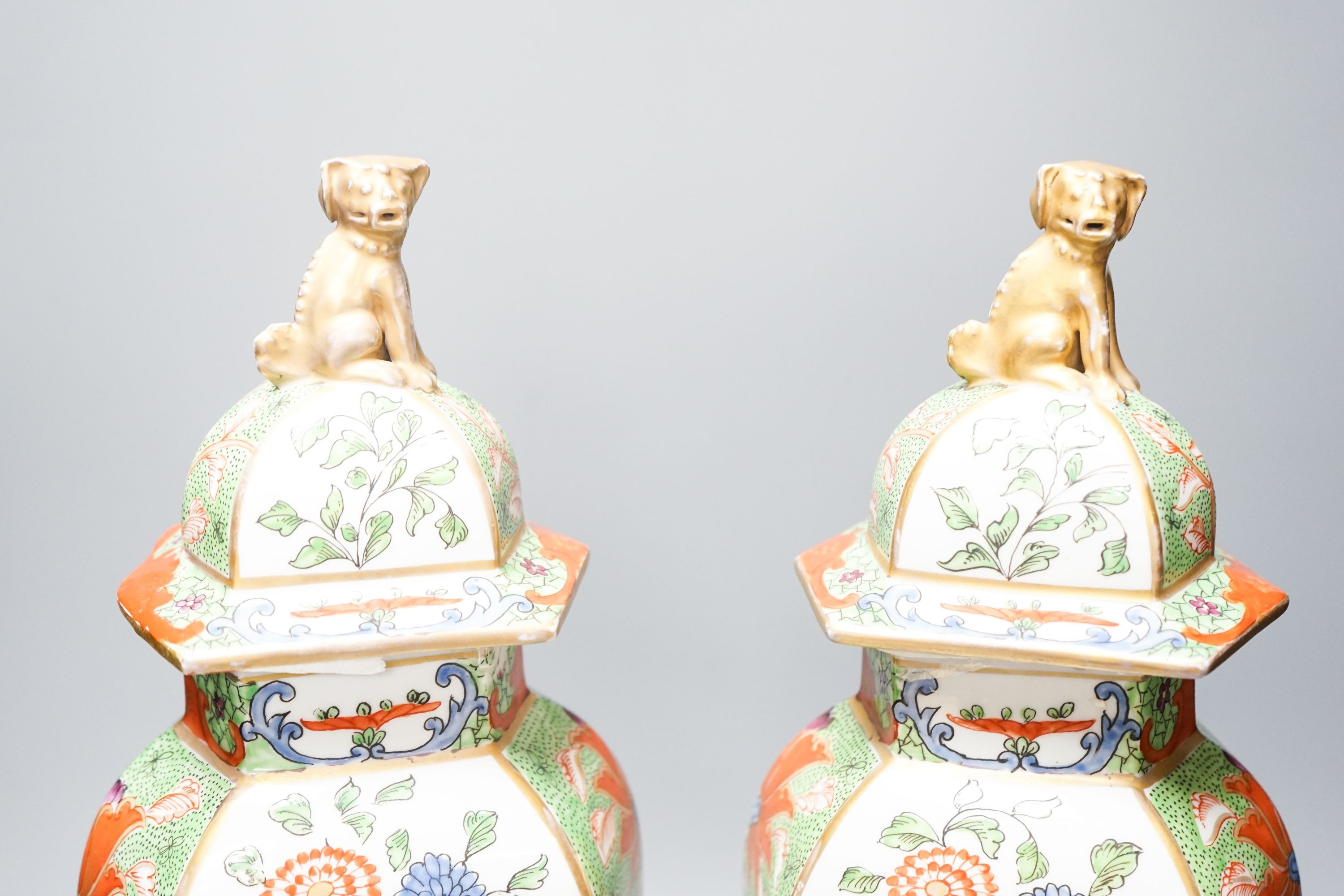 A pair of Samson kakiemon style lidded hexagonal baluster vases 41cm
